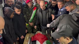 Palestinian security forces carry the body of Majed al-Aydi, who was earlier today shot and critically injured by Israeli army gunfire, during his funeral in the West Bank city of Nablus