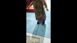 Baby Girl with dress, using my heels, and walk around on living room.