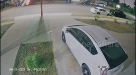 Hit and Run: White Car Smashes into Parked Vehicle Causing Massive Damage