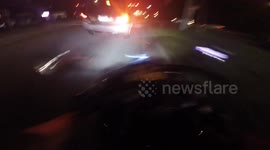 Close Call: Motorcyclist Trying to Beat Amber Signal Almost Crashes