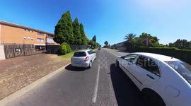Close Call: Vehicle Tries to Recklessly Overtake a Motorcyclist
