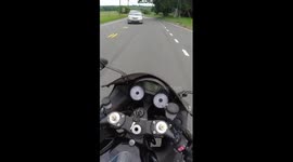 Close Call: Oncoming Car Doesn't Pay Attention to Motorcyclist Nearly Causing Collision