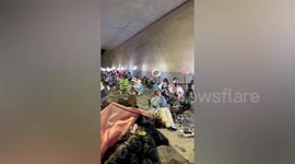 Group of online broadcasters gather under bridge to live stream in China