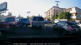 Accident: Red Pick-Up Truck Sideswipes Grey Vehicle Due to Limited Visibility