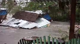 Dramatic footage shows Philippines house collapsing during flood as filmer cries