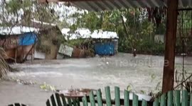 Flash flood washes away homes amid heavy rain in the Philippines