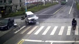 Driver not wearing seatbelt flies out of minibus after collision in China