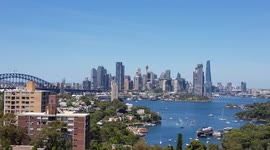 Unique video of SailGP New Zealand super yacht sailing across Sydney harbour and panoramic city background