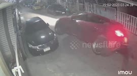 Bungling driver crashes into parked car and rolls on side wheels
