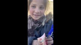 Afghan child overjoyed as woman buys all pens she is selling on streets to make living