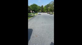 Kid loads trashed gaming chair on his scooter and drives home!