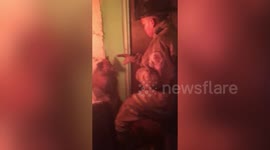 Brave firemen save pet dog from burning house