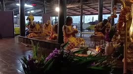 Storm whips through temple while Buddhist monks pray