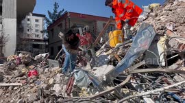 Groups working on buildings damaged by quake in Nurdagi, Turkiye