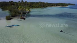 Drone fotage visitor enjoyed white sand and clean beach in Mentawai Islands, West Sumatra, Indonesia, on February 8, 2023.