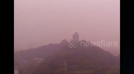 Red smog shrouds sky above Nanjing, China