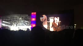 Kendrick Lamar fan freezes-up on stage, forgets lyrics to his song while another fan jumps on stage