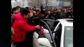 Police smash car to save three children locked in- version 2