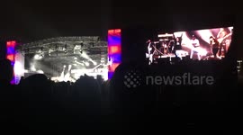 Kendrick Lamar fan freezes up on stage before another tries to jump up