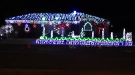 Man's amazing synchronised Xmas lights - with fire jet