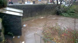 Flooded river in Littleborough