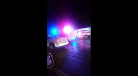 Footage of damage and emergency services on the i30 following Garland tornado
