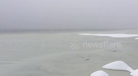 Amazing concentric circles in freezing lake