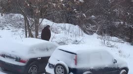 Guy goes to the loo in the snow in public