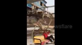 Scared skiers jump off rolling-back chairlift at Beijing ski field