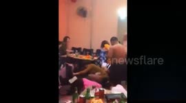 Drunk man throws cash at party with former classmates