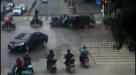 SUV crashes into four scooters after accelerating by mistake