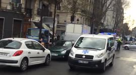 Medical and police responders arrive in Paris as crowd gathers