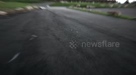 Hail Hitting Ground in Slow Motion