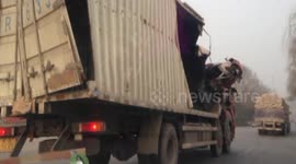 Half crushed lorry still going strong on the road