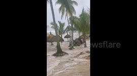 Strong wind damages parasols as cyclone hits Mauritius