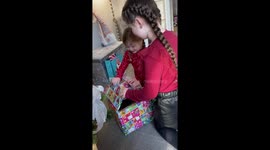 Girls finally get a miniature Dachshund puppy after a year of asking for one