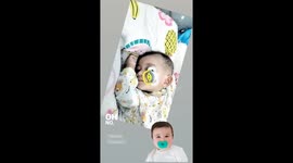 Sleep with his style. My boy with his pacifier.