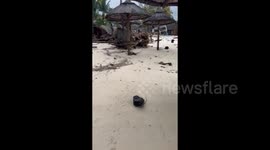 Parasols strewn across beach as Tropical Cyclone Freddy hits Mauritius
