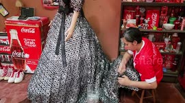 Filipino woman makes gown from 20,000 soda can tabs in tribute to late father