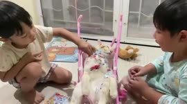 Lazy pet cat sleeps as owners stick it full of heart stickers