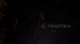 Rider flung from motorcycle after hitting dangling power cables