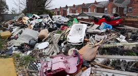 Life on one of 'Britain's grottiest streets' where mountain of fly-tipped waste is so big it can be seen from space