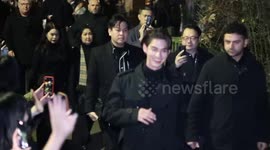 Taiwanese actor bright leaving the burberry autmn winter fashion shownin london kennington park