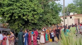 A group of people visit the Samaleswari temple during Diwali  in Odisha