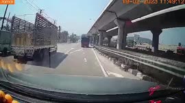 Overloaded truck topples over while making motorway U-turn