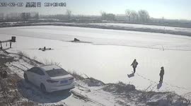 Three-wheeler sinks after man drives it over frozen pond in northern China