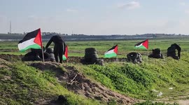 Protesters burn tires against the killing of 10 Palestinians during an Israeli raid