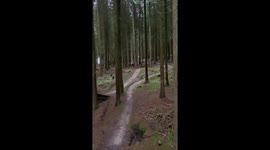 Mountain biking fail, guy has to jump off the mountain bike after it gets stuck mid stunt
