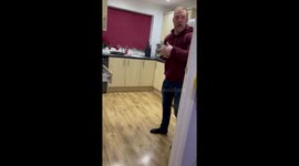Husband is caught passionately singing Whitney Houston while doing dishes