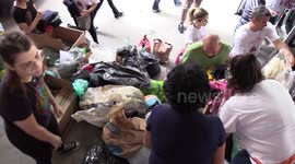 Volunteers collect donations for those affected by Brazil storm